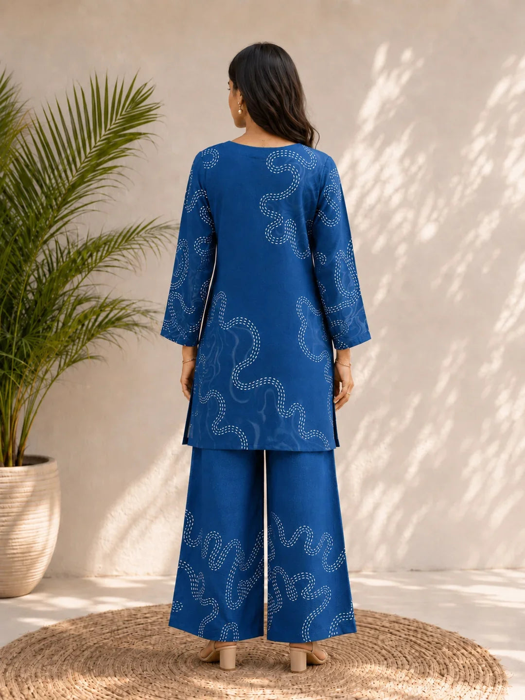 Blue Kurta Set with Floral & Abstract Print in Muslin Silk